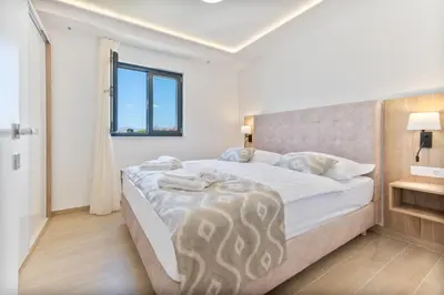 Krevet ili kreveti u jedinici u objektu Aparthotel Remaneo