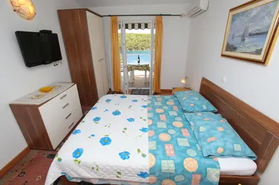 Krevet ili kreveti u jedinici u objektu Apartments Jole