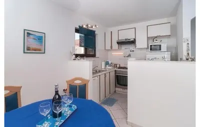 Kuhinja ili čajna kuhinja u objektu Apartment Supetar With Sea View Xii