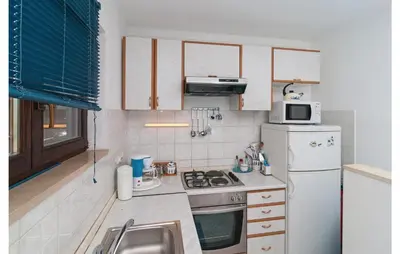 Kuhinja ili čajna kuhinja u objektu Apartment Supetar With Sea View Xii