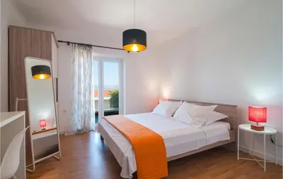 Krevet ili kreveti u jedinici u objektu Nice Apartment In Sutivan With House Sea View