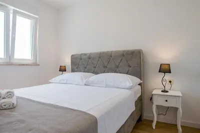 Krevet ili kreveti u jedinici u objektu Residence Ivano