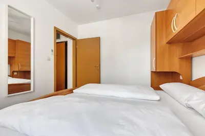 Krevet ili kreveti u jedinici u objektu Near The Beach Luxury Apt Matteo