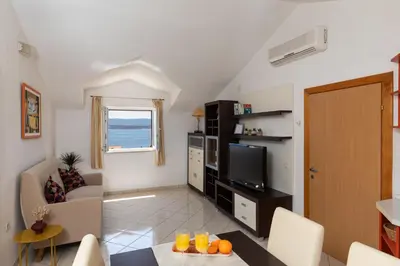 TV i/ili zabavni centar u objektu Apartments Paloc - Orange
