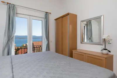 Krevet ili kreveti u jedinici u objektu Apartments Paloc - Green