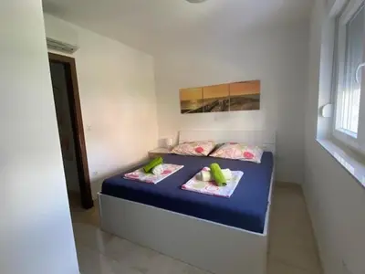 Krevet ili kreveti u jedinici u objektu Luxury Apartment Ani 100m to See with Pool & Parking
