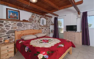 Krevet ili kreveti u jedinici u objektu Gorgeous Home In Povlja