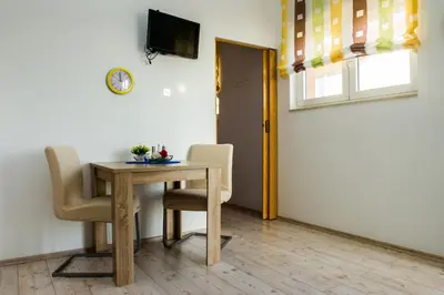 TV i/ili zabavni centar u objektu Apartments Nino