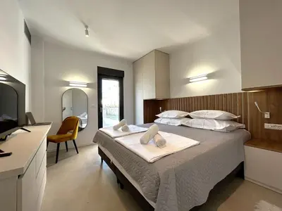 Krevet ili kreveti u jedinici u objektu Sandi Hvar Apartments