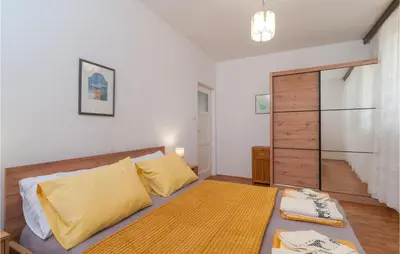 Krevet ili kreveti u jedinici u objektu 2 Bedroom Beautiful Apartment In Supetar