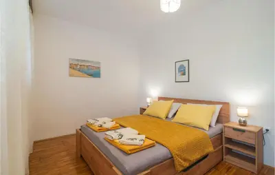 Krevet ili kreveti u jedinici u objektu 2 Bedroom Beautiful Apartment In Supetar