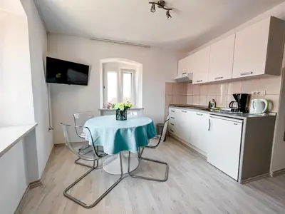 Kuhinja ili čajna kuhinja u objektu Central apartments Bol