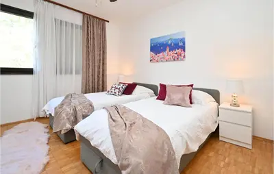 Krevet ili kreveti u jedinici u objektu 3 Bedroom Lovely Home In Blato Na Cetini