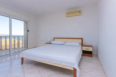 Krevet ili kreveti u jedinici u objektu Apartments with WiFi Stanici, Omis - 19941