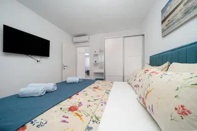 Krevet ili kreveti u jedinici u objektu Apartmani Marivo