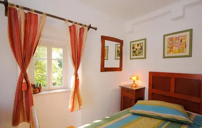 Krevet ili kreveti u jedinici u objektu Antique apartment in the center of Brela