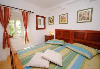 Krevet ili kreveti u jedinici u objektu Antique apartment in the center of Brela