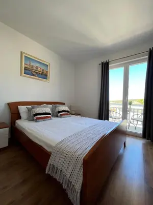 Krevet ili kreveti u jedinici u objektu Apartmani Bakovic