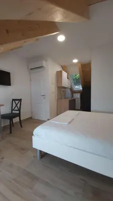 Krevet ili kreveti u jedinici u objektu Apartmani Nona