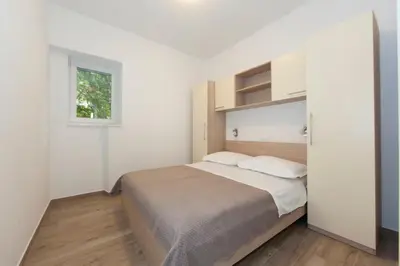 Krevet ili kreveti u jedinici u objektu Apartmani Nona