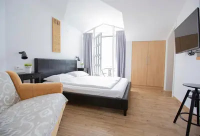 TV i/ili zabavni centar u objektu Guesthouse Seaview