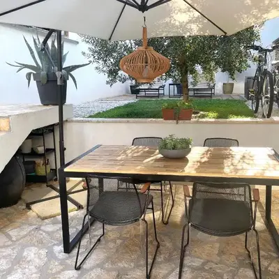 Great outdoor living steps away from the beach