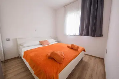 Krevet ili kreveti u jedinici u objektu Villa La Famiglia with private heated pool