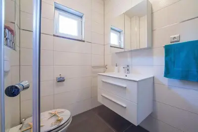 Kupaonica u objektu Villa La Famiglia with private heated pool