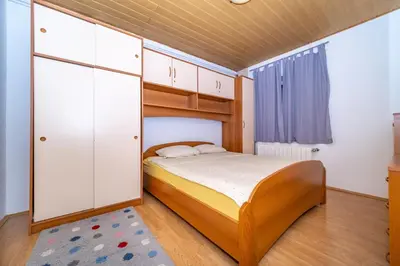 Krevet ili kreveti u jedinici u objektu Apartments by the sea Postira, Brac - 20151