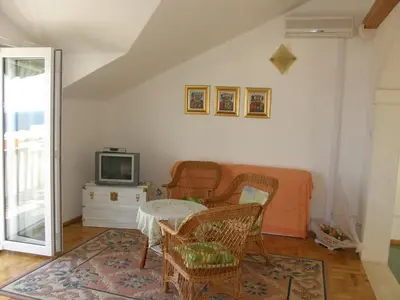 TV i/ili zabavni centar u objektu 3416-3 Apartment in Bol with sea view, balcony, air conditioning, WiFi