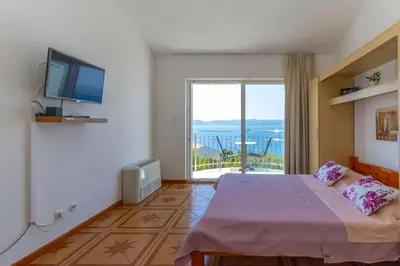 TV i/ili zabavni centar u objektu Apartments Dream view