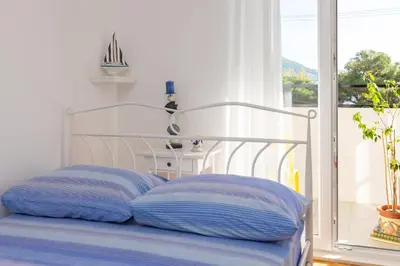 Krevet ili kreveti u jedinici u objektu Bounty Apartment