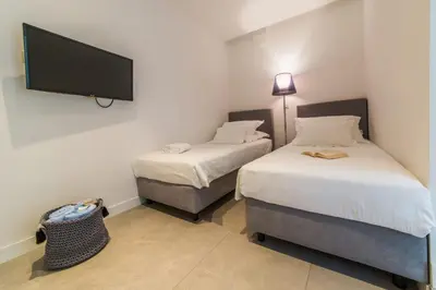 Krevet ili kreveti u jedinici u objektu Ferienwohnung in Brela mit Meerblick, Terrasse, Klimaanlage, W-LAN 201-10