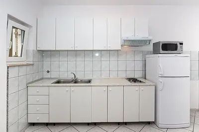 Kuhinja ili čajna kuhinja u objektu Apartment in Duce with sea view, terrace, air conditioning, WiFi 3423-3