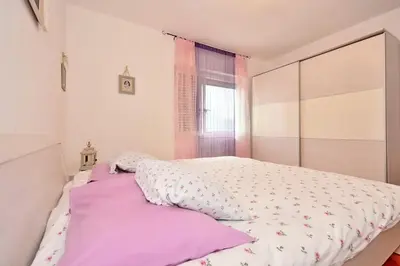 Krevet ili kreveti u jedinici u objektu Family apartment near sea