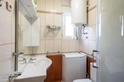 Kupaonica u objektu Apartmani Jakov