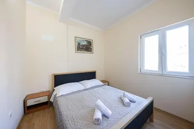 Krevet ili kreveti u jedinici u objektu Apartmani Jakov
