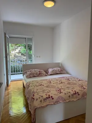 Krevet ili kreveti u jedinici u objektu Apartman Dragan