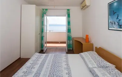 Krevet ili kreveti u jedinici u objektu 2 Bedroom Cozy Apartment In Suhi Potok, Jesenice