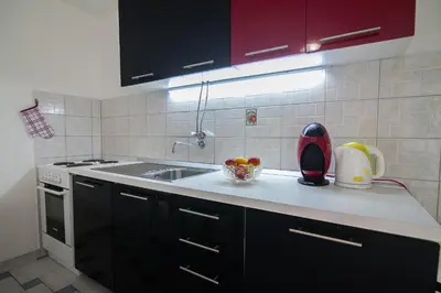 Kuhinja ili čajna kuhinja u objektu Aurora Apartments