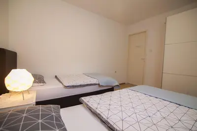 Krevet ili kreveti u jedinici u objektu Aurora Apartments