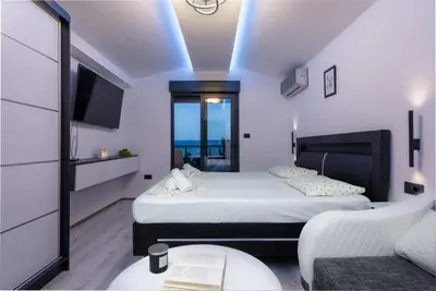 Krevet ili kreveti u jedinici u objektu Ivana Black & White Apartments - Marusici