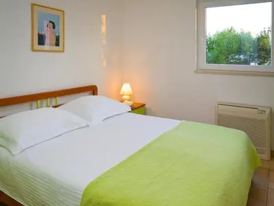 Krevet ili kreveti u jedinici u objektu Apartment in Brela with sea view, terrace, air conditioning, WiFi 201-1