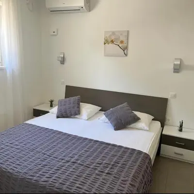 Krevet ili kreveti u jedinici u objektu Cala Apartments