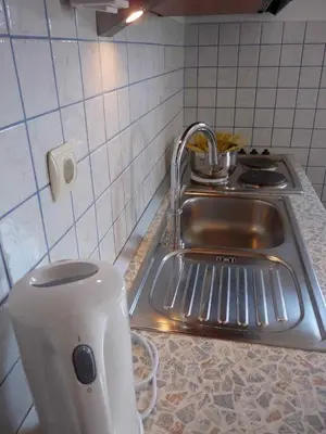 Kuhinja ili čajna kuhinja u objektu Apartment in Bol with sea view, terrace, air conditioning, WiFi 5121-1
