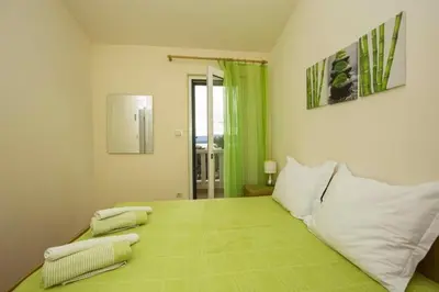 Krevet ili kreveti u jedinici u objektu Apartment in Bol with sea view, terrace, air conditioning, WiFi 5121-2