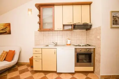 Kuhinja ili čajna kuhinja u objektu Apartment in Bol with sea view, terrace, air conditioning, WiFi 5121-5