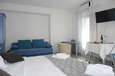 TV i/ili zabavni centar u objektu Studio apartment in Dugi Rat with sea view, balcony, air conditioning, WiFi 5132-3