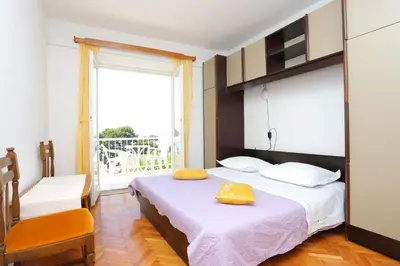 Krevet ili kreveti u jedinici u objektu Apartments by the sea Brela, Makarska - 20598