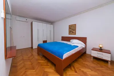 Krevet ili kreveti u jedinici u objektu Apartments by the sea Brela, Makarska - 20778